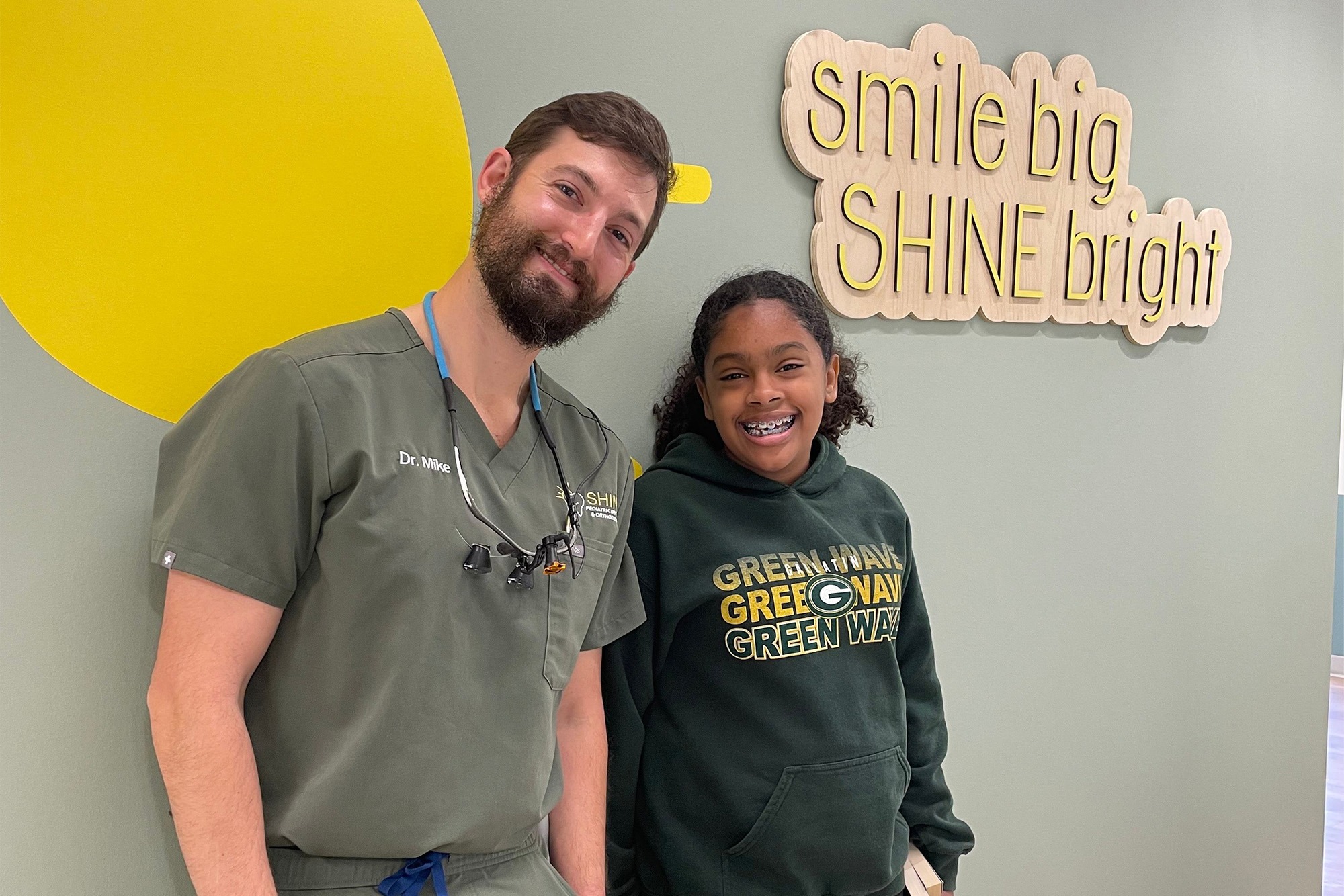 doc and patient smiling together